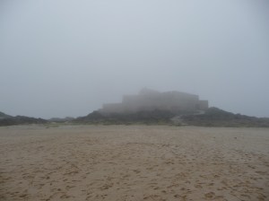 The fort peeping through the fog